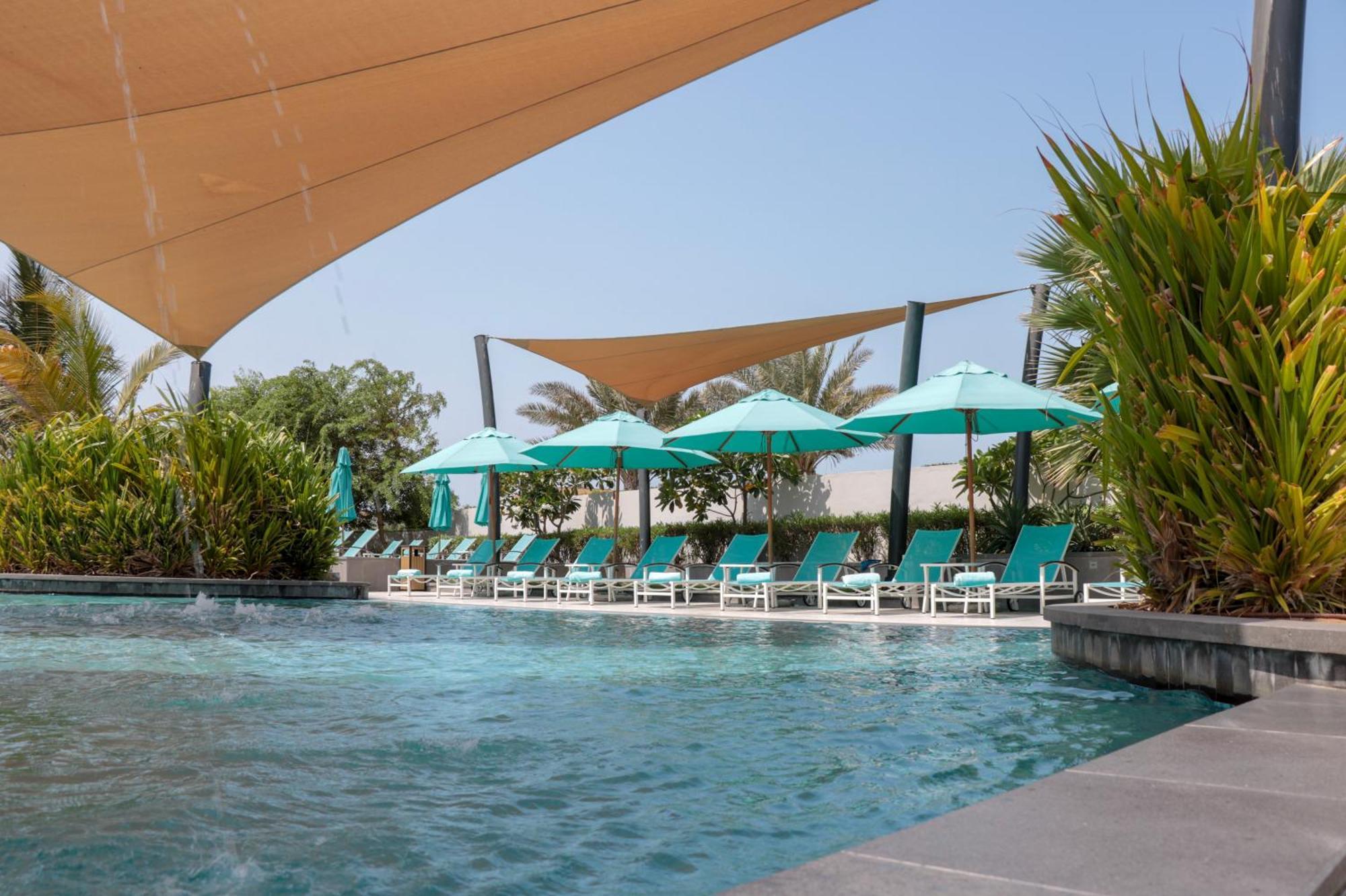 Bay La Sun Hotel And Marina - Emaar King Abdullah Economic City Exterior photo The swimming pool at the hotel