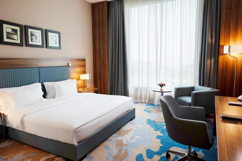 Bay La Sun Hotel And Marina - Emaar King Abdullah Economic City Exterior photo A room at the hotel