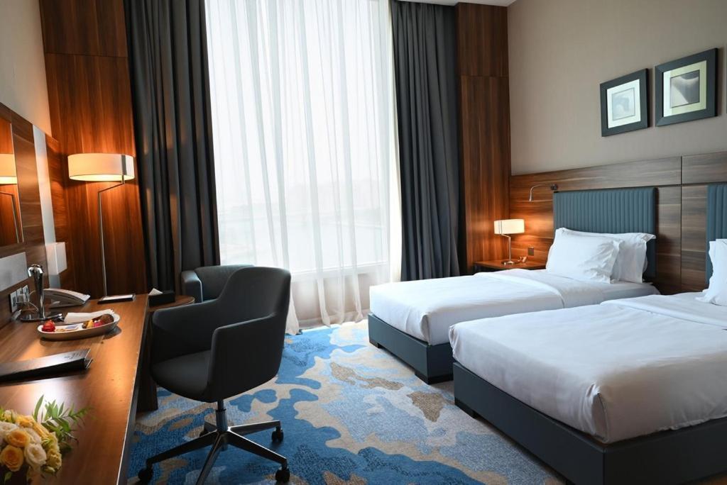 Bay La Sun Hotel And Marina - Emaar King Abdullah Economic City Exterior photo A room at the hotel